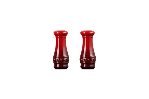 Le Creuset shakers Cerise, porcelain-enamel coating resists stains.