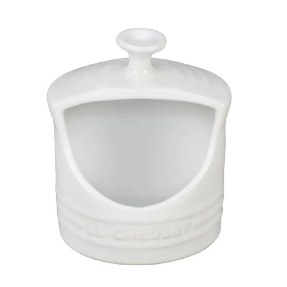 Le Creuset salt crock with side-opening for easy salt access during cooking.