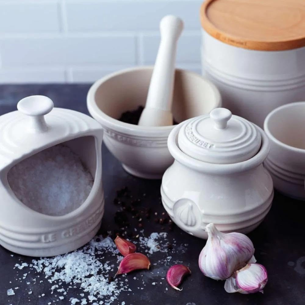 Le Creuset salt crock white glaze adds classic kitchen style.