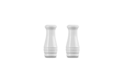 Le Creuset salt and pepper shakers—close-up, high-fired stoneware for everyday seasoning.