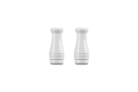 Le Creuset salt and pepper shakers—close-up, high-fired stoneware for everyday seasoning.