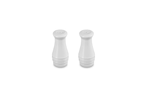 Le Creuset white salt and pepper shakers—top view, enamel finish resists odors and stains.