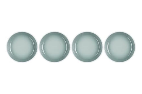 Le Creuset Sea Salt pasta bowls stacked neatly save cabinet space and reveal a smooth glaze.