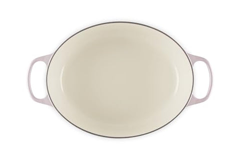 Le Creuset interior enamel enables easy monitoring during cooking.