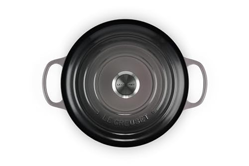 Le Creuset Signature Round Dutch Oven Oyster interior enamel for easy cooking progress monitoring.