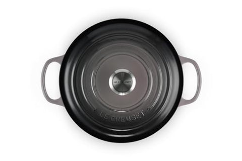 Le Creuset Signature Round Dutch Oven Oyster interior enamel for easy cooking progress monitoring.