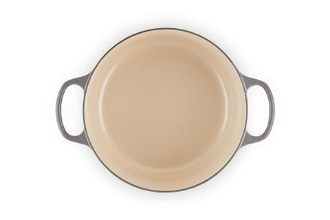 Le Creuset Oyster lid and knob design locks in moisture for braising.