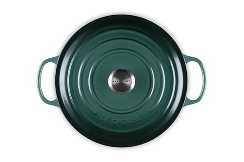 Le Creuset interior enamel in light color helps monitor browning and progress.