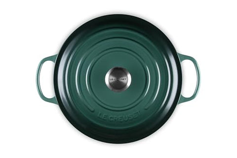 Le Creuset interior enamel in light color helps monitor browning and progress.