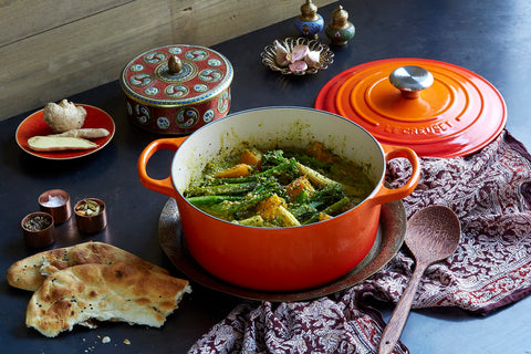 Le Creuset Signature round Dutch oven flame in oven demonstrates oven-safe versatility.