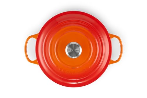 Le Creuset Signature round Dutch oven flame interior enamel promotes caramelization and easy cleaning.