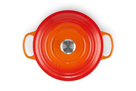 Le Creuset Signature round Dutch oven flame interior enamel promotes caramelization and easy cleaning.