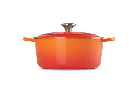 Le Creuset Signature round Dutch oven flame wide loop handles aid safe grip.
