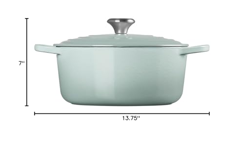 Le Creuset Dutch Oven in Sea Salt with roasted vegetables on table
