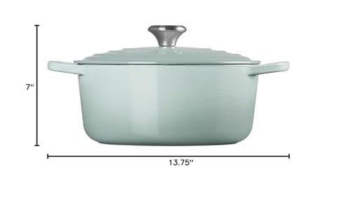 Le Creuset Dutch Oven in Sea Salt with roasted vegetables on table