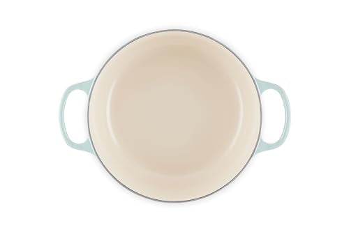 Interior light enamel of Le Creuset Dutch Oven for monitoring cooking progress