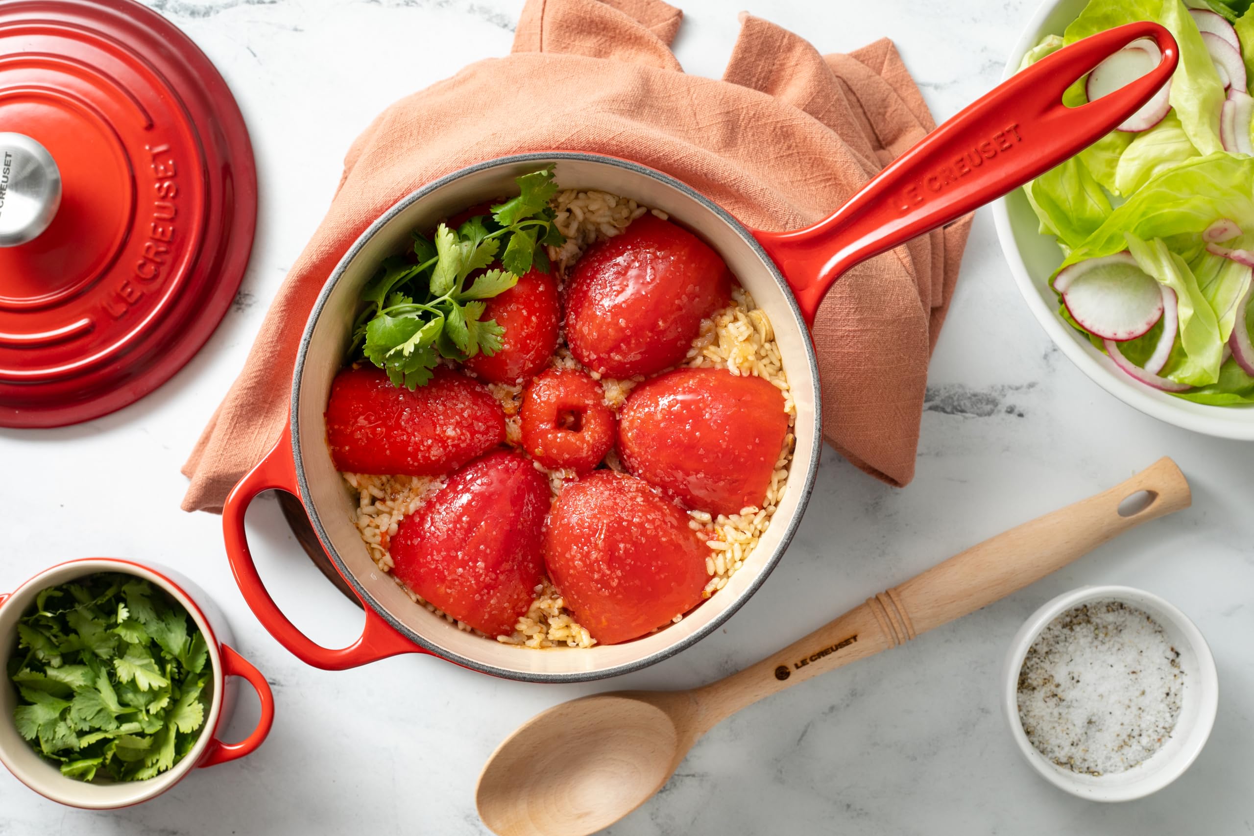 Le Creuset Signature Saucepan Caribbean dishwasher-safe enamel for quick cleanup.
