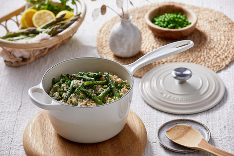 Le Creuset Signature Saucepan Caribbean ergonomic handles for easy lifting.