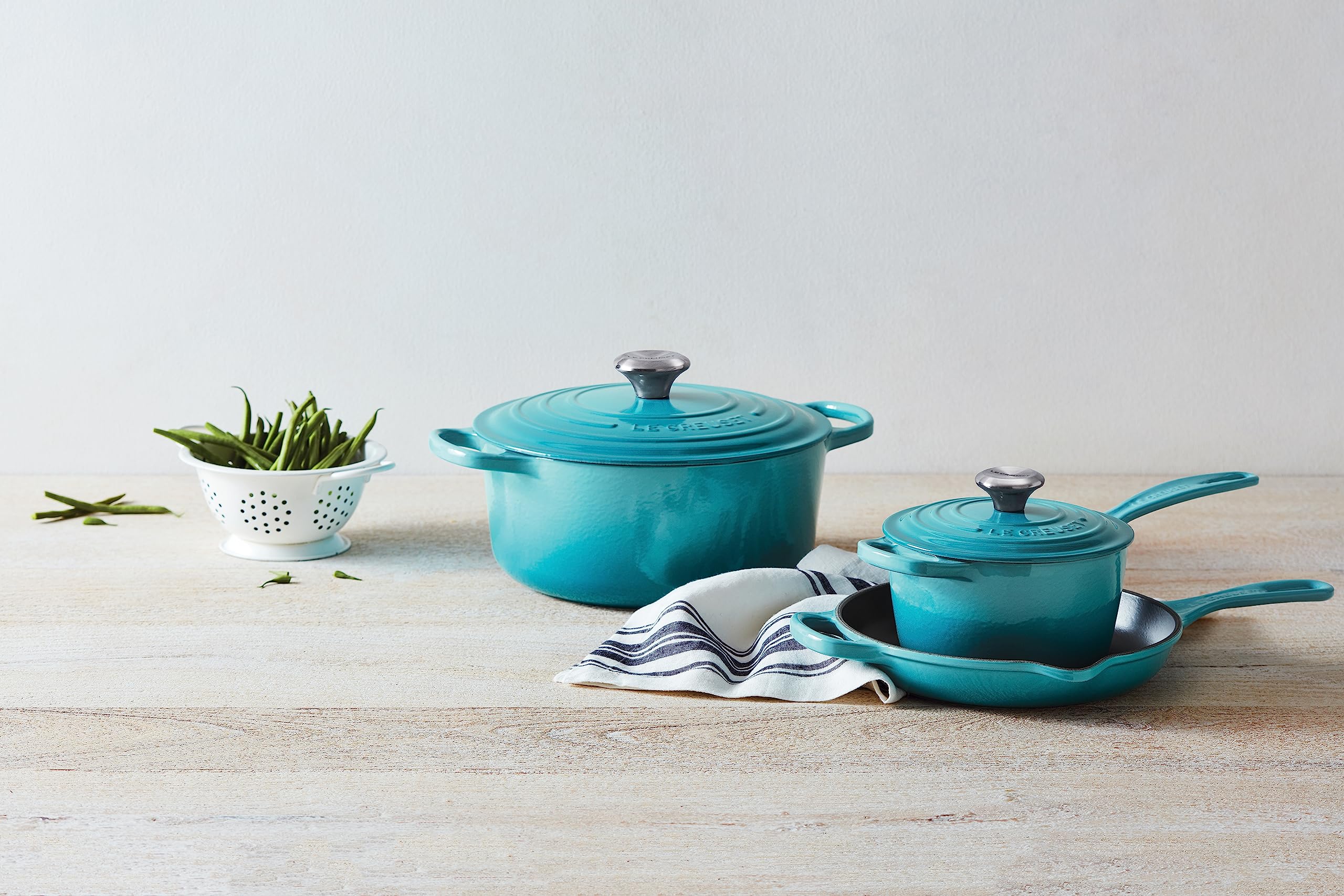 Le Creuset Signature Saucepan Caribbean table-ready before serving.