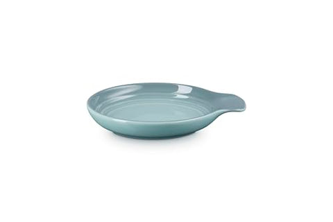 Le Creuset Signature Spoon Rest Sea Salt on table setting keeps counters clean during meals