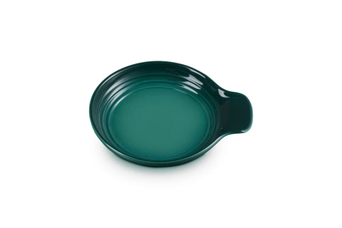 Le Creuset Signature Stoneware Spoon Rest Artichaut for quick clean-up after cooking.