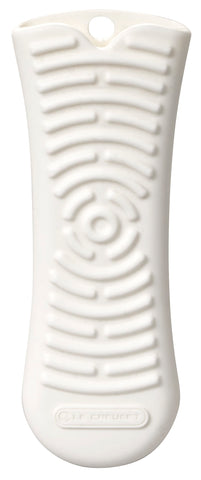 Le Creuset Cool Tool silicone handle sleeve on a white 5.75-inch handle protects hands during transfers
