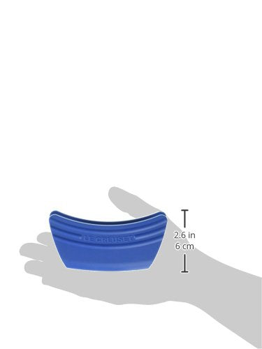 Le Creuset grips on stovetop pots for cool, controlled handling
