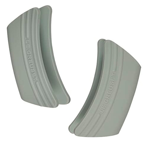 Le Creuset silicone handle grips for stovetop use provide safe handling and easy cleaning.