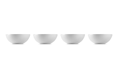 Le Creuset bowls stacked, showcasing space-saving design and uniform glaze.
