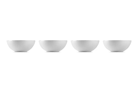 Le Creuset bowls stacked, showcasing space-saving design and uniform glaze.
