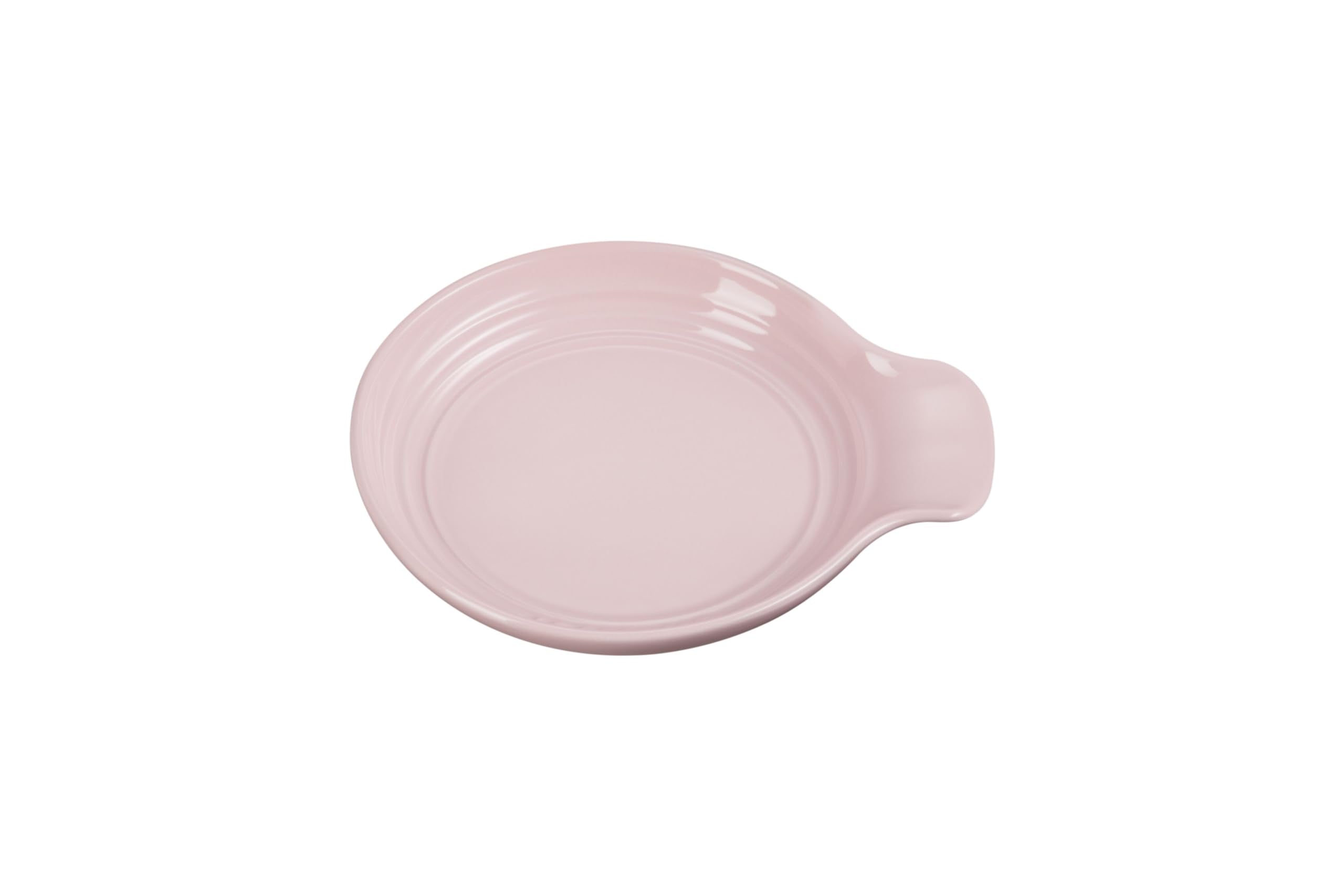 Le Creuset spoon rest round 6-inch chiffon pink keeps counters clean.