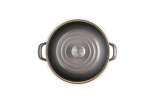 Le Creuset enamel interior emphasizes nonreactive surface preventing flavor transfer.