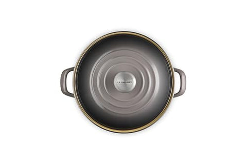 Le Creuset enamel interior emphasizes nonreactive surface preventing flavor transfer.