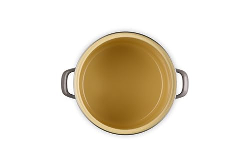 Le Creuset stockpot with stainless steel knob ensures safe, cool handling.