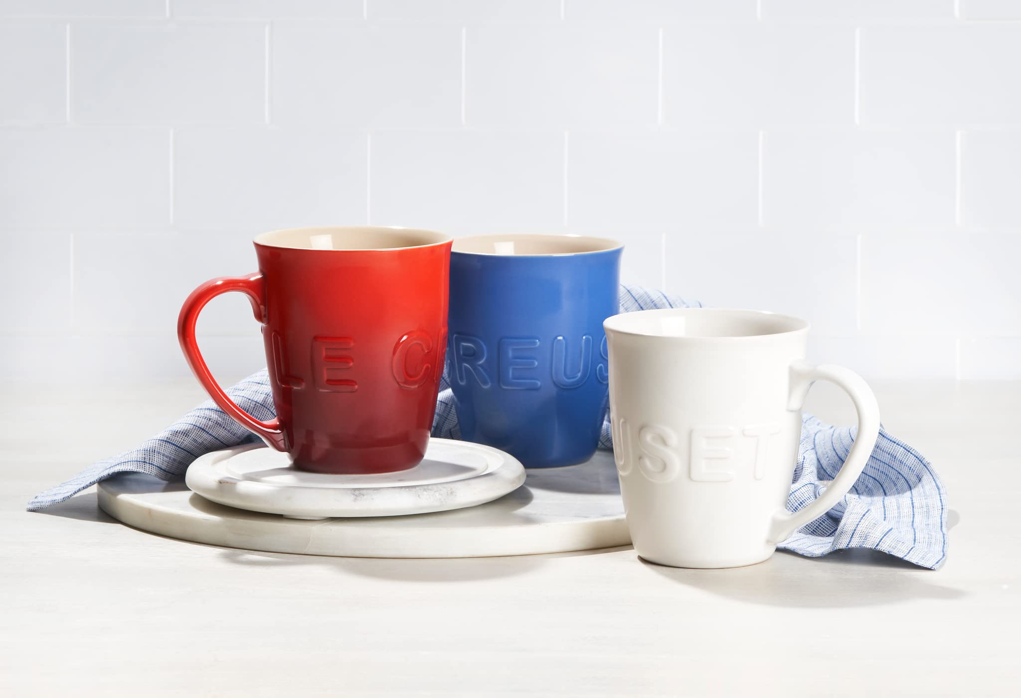 Le Creuset mug with glossy vibrant glaze for easy cleaning and color