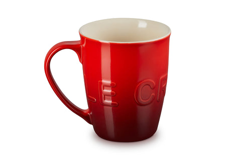 Le Creuset mug with comfortable handle grip for easy sipping