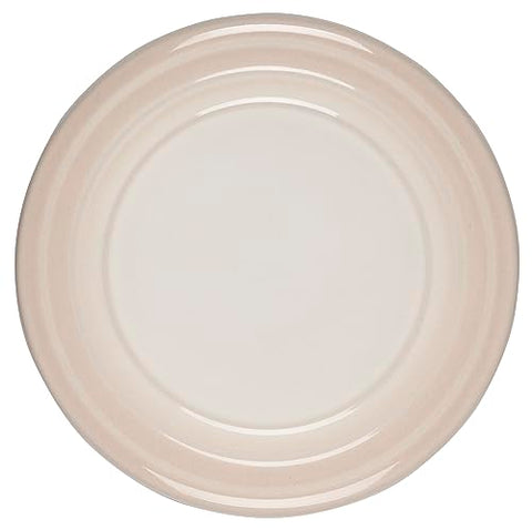 Texture detail of Le Creuset stoneware highlighting dense, durable surface.