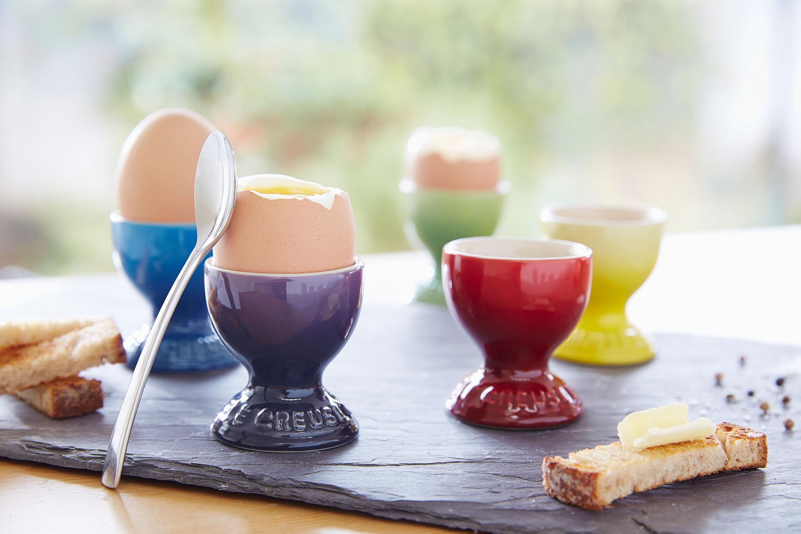 Le Creuset stoneware preserves heat for serving warmth.