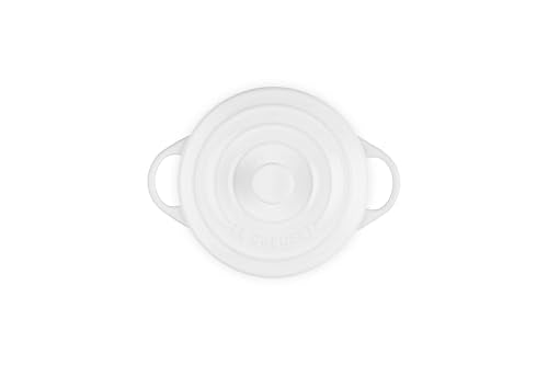 Le Creuset cocotte with lid demonstrates even heat distribution for browning.