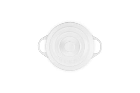 Le Creuset cocotte with lid demonstrates even heat distribution for browning.