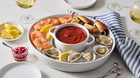 Le Creuset cocotte oven-safe up to 400 F for versatile cooking.