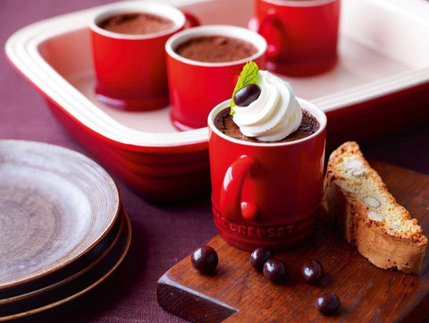 Le Creuset stoneware mug with Cerise glaze showing vibrant color and durability