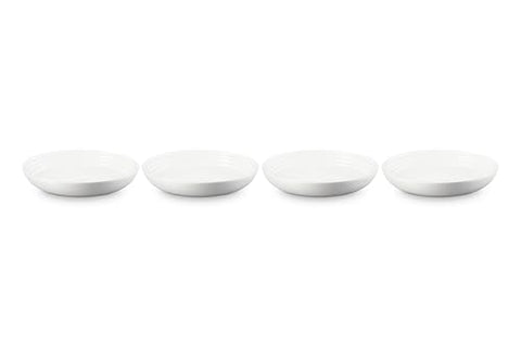 Le Creuset pasta bowls close-up glaze highlights non-porous, stain-resistant surface.
