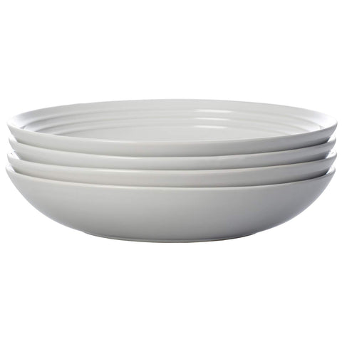 Kitchen scene with stackable bowls saving cabinet space.