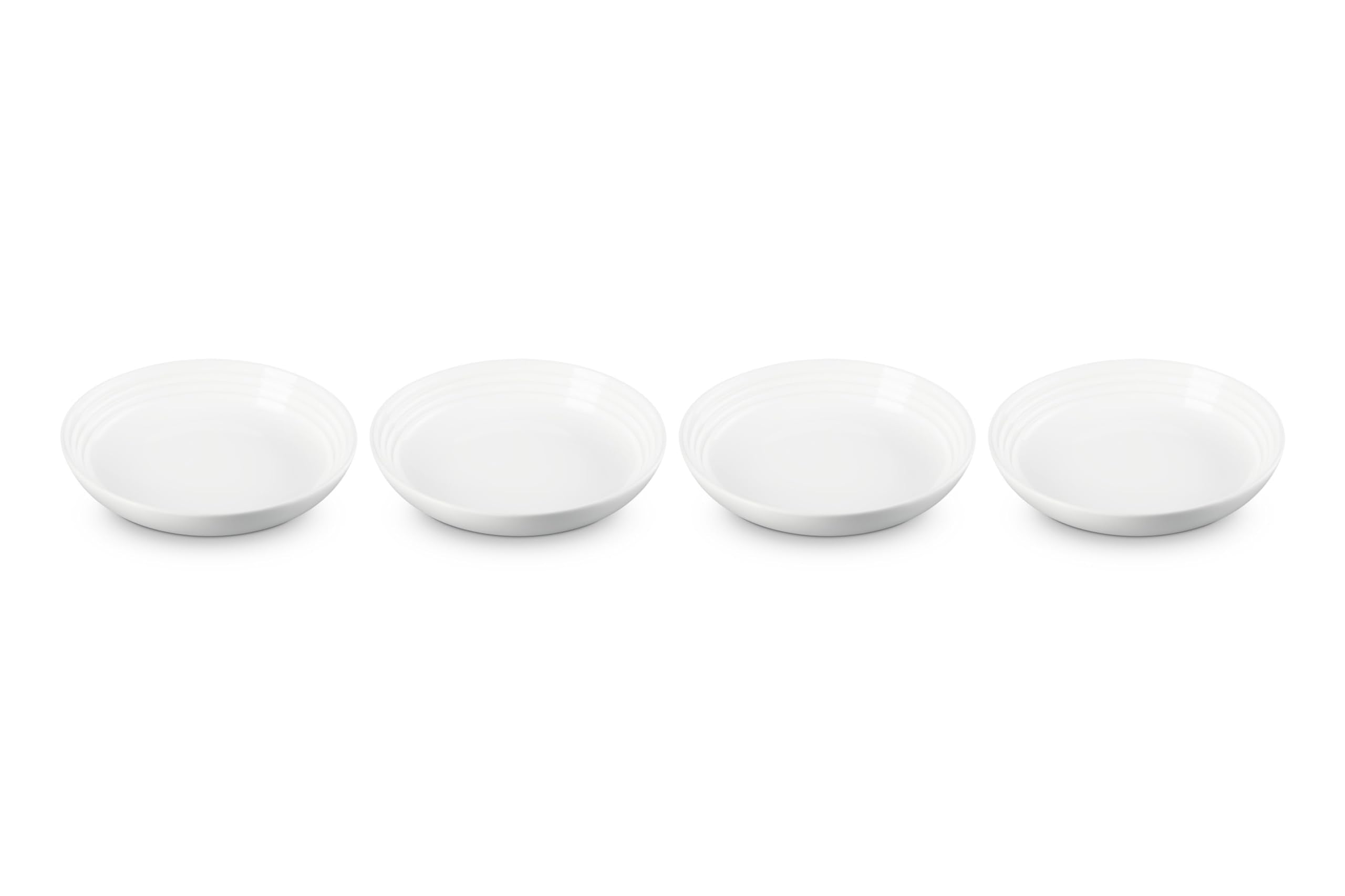 Le Creuset stoneware pasta bowls set, top view, ideal for everyday meals with a vibrant glaze.