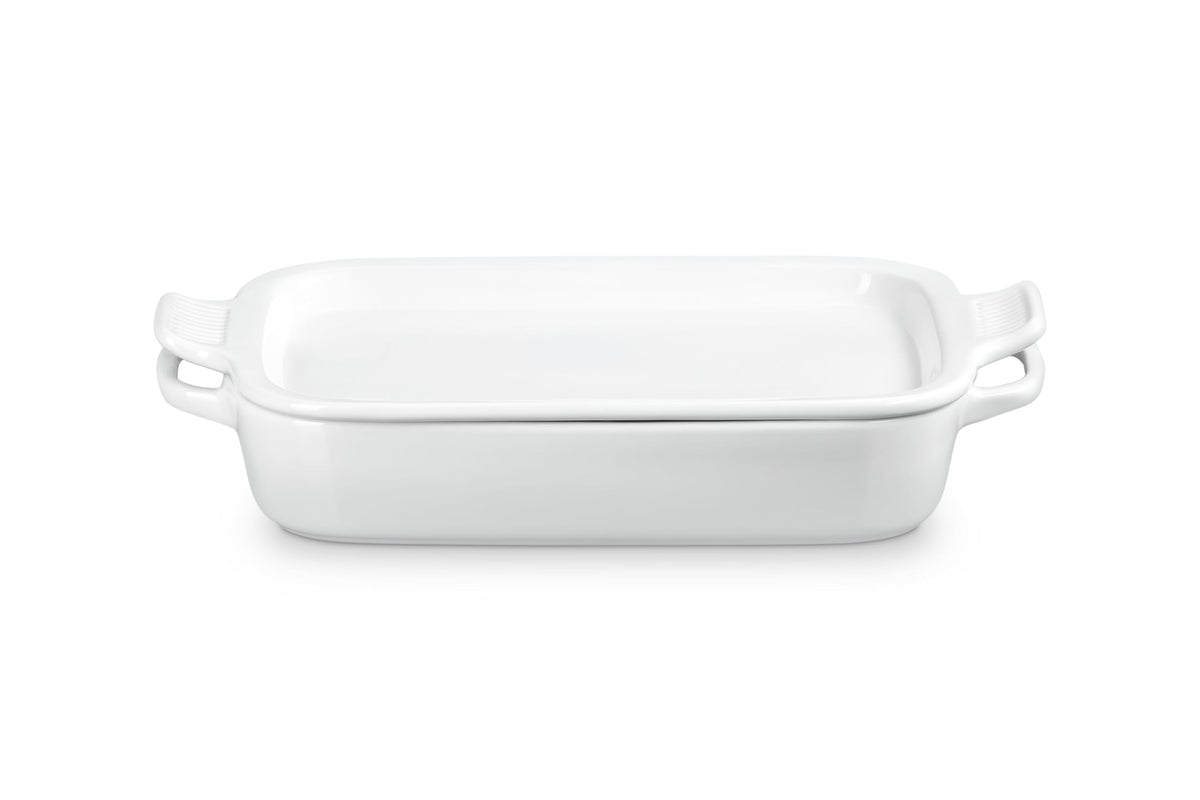 Le Creuset rectangular stoneware dish with platter lid in white, front view for oven-to-table use