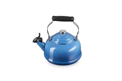 Le Creuset tea kettle with whistle visible signals when water reaches a boil.