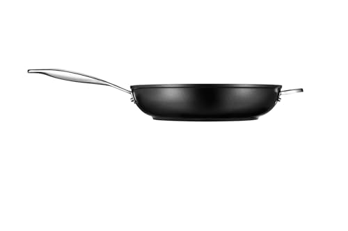 Stay-cool ergonomic handle closeup on Le Creuset PRO pan for easy transfers