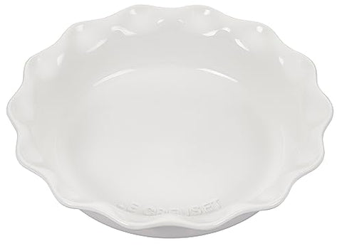 Close-up of Le Creuset white glaze highlighting scratch-resistant, non-porous surface.