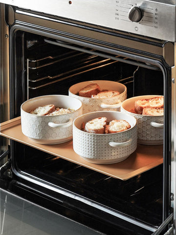 Le Tauci bowls enhance table presentation with a warm, stylish look.